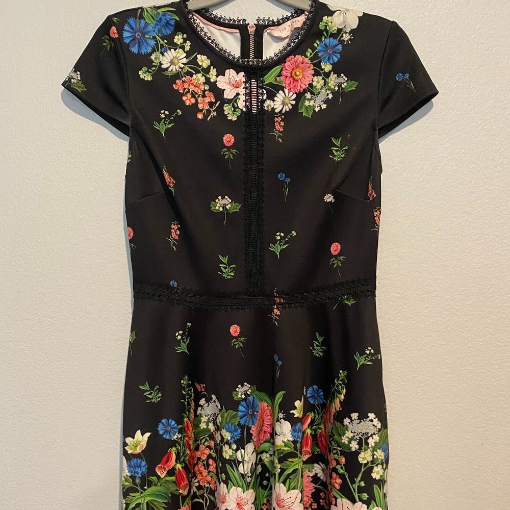 black skater dress with flowers